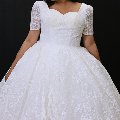 Detail of neckline and bodice on White Ball Gown — GownLink GLGT166B