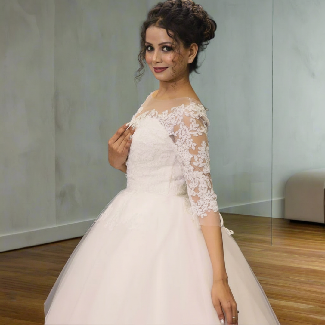 White princess-style wedding dress with floral lace embroidery and elegant bridal styling