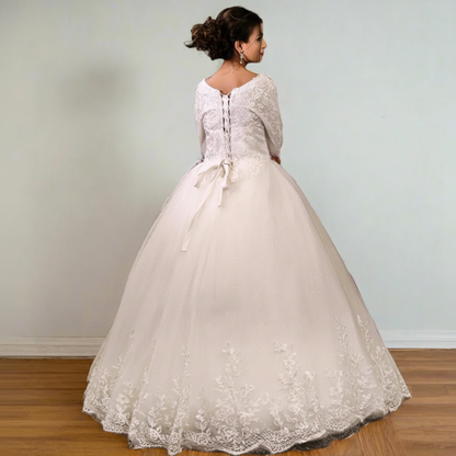 Luxury Christian wedding gown featuring a lace bodice, soft tulle skirt, and graceful bridal elegance