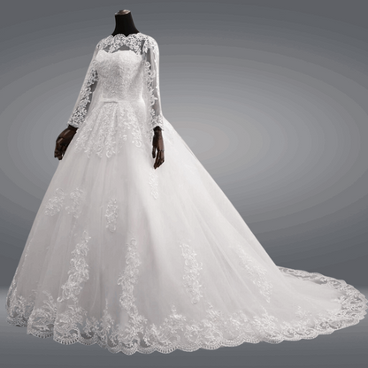 Luxury Christian wedding dress with intricate lace appliqué and a voluminous bridal skirt by GownLink