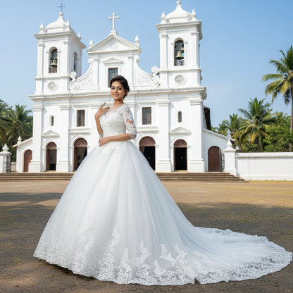 Modest Christian bridal ball gown with lace sleeves and a timeless silhouette for church ceremonies