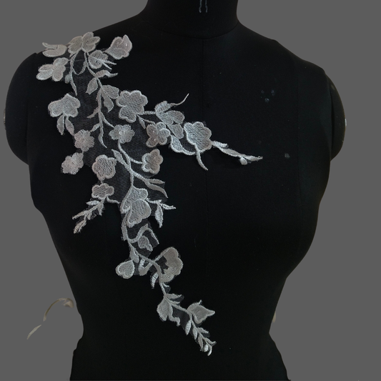 Matching Patch on the gown and veil tie the look together in Chamba