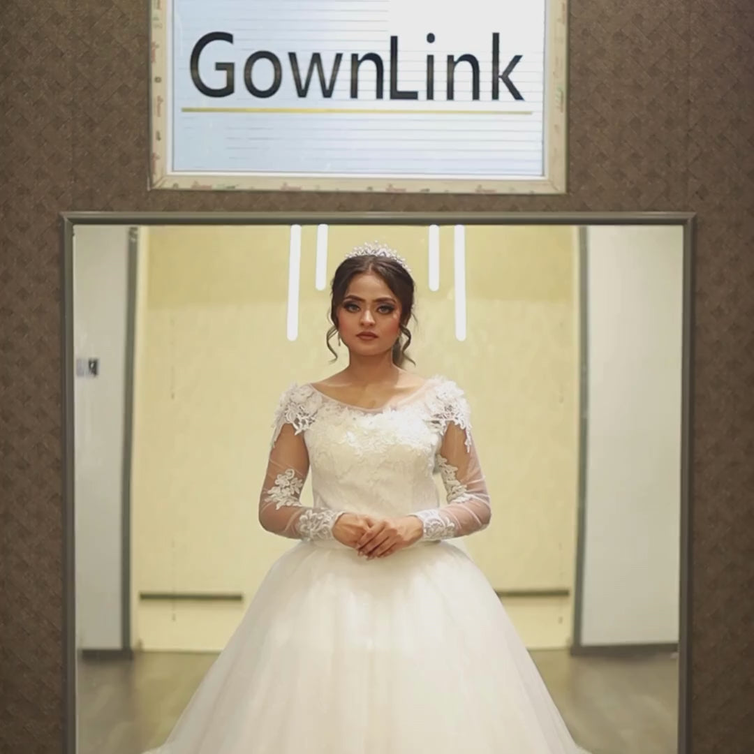 White Roman-style wedding gown for bride in Shillong


