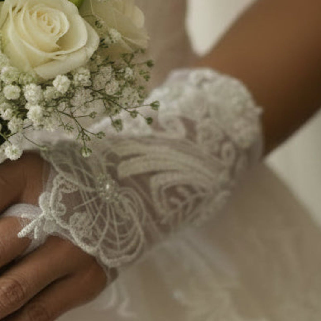 Close-up of pearl or crystal detail on Bridal Gloves — GownLink G24