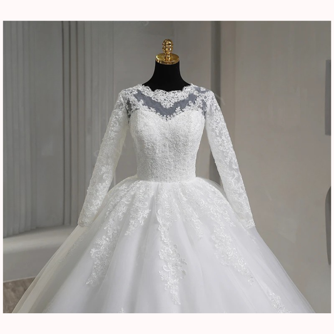 Royal princess bridal gown with lace sleeves and cathedral-length train