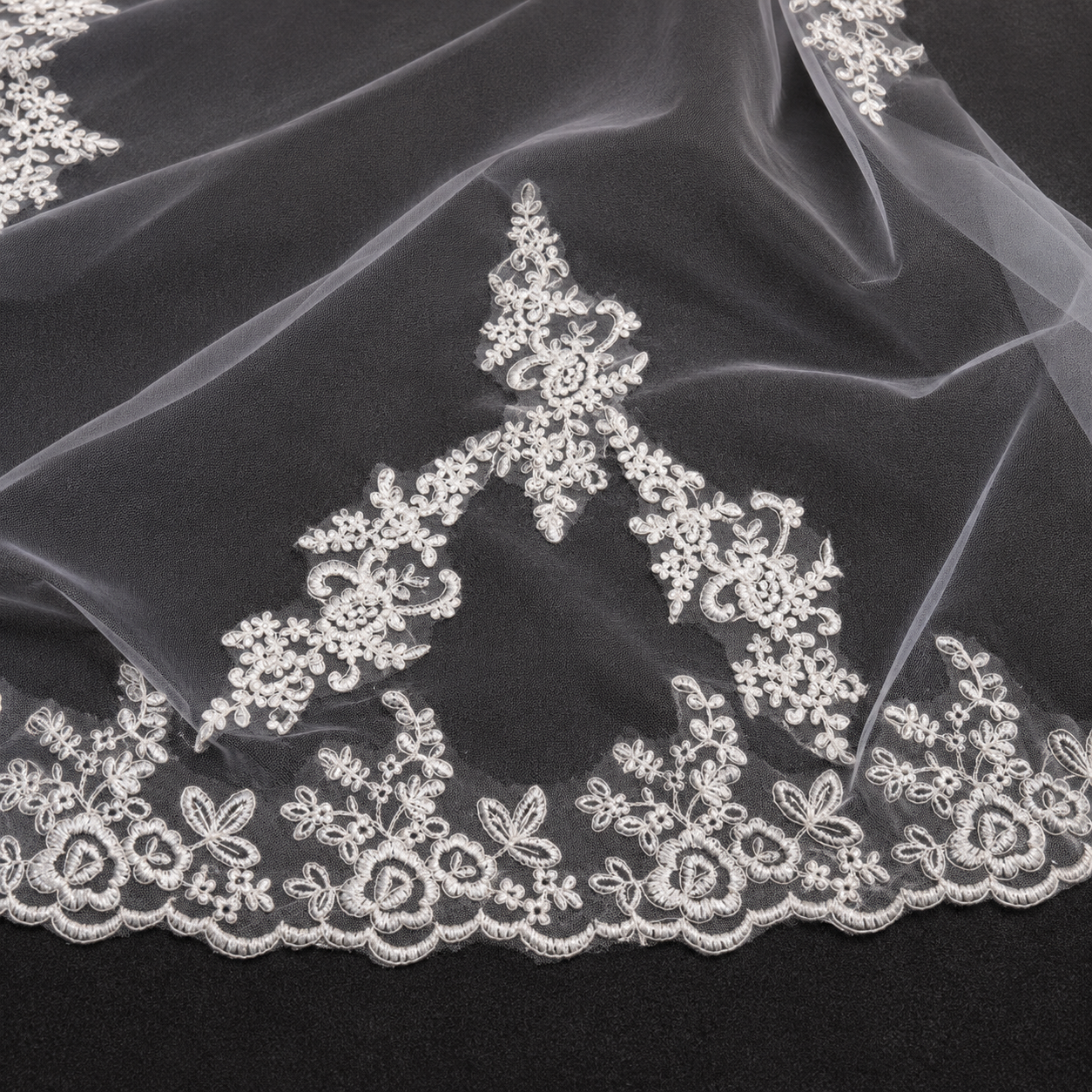 Flat lay of Bridal Lace Patch on white surface — GownLink GLVHL08