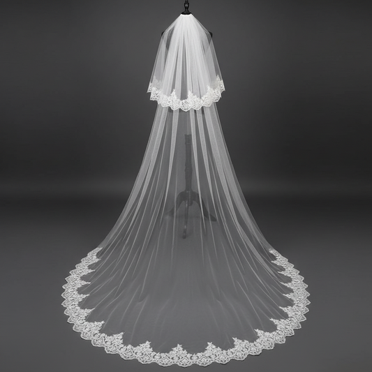 Long bridal veil with intricate lace border for elegant wedding attire