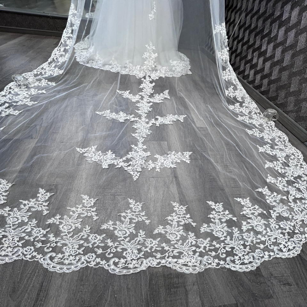 Long lace bridal veil for church wedding with elegant cathedral style